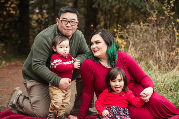 Wong family holiday photo session with everyone looking silly but more true to form