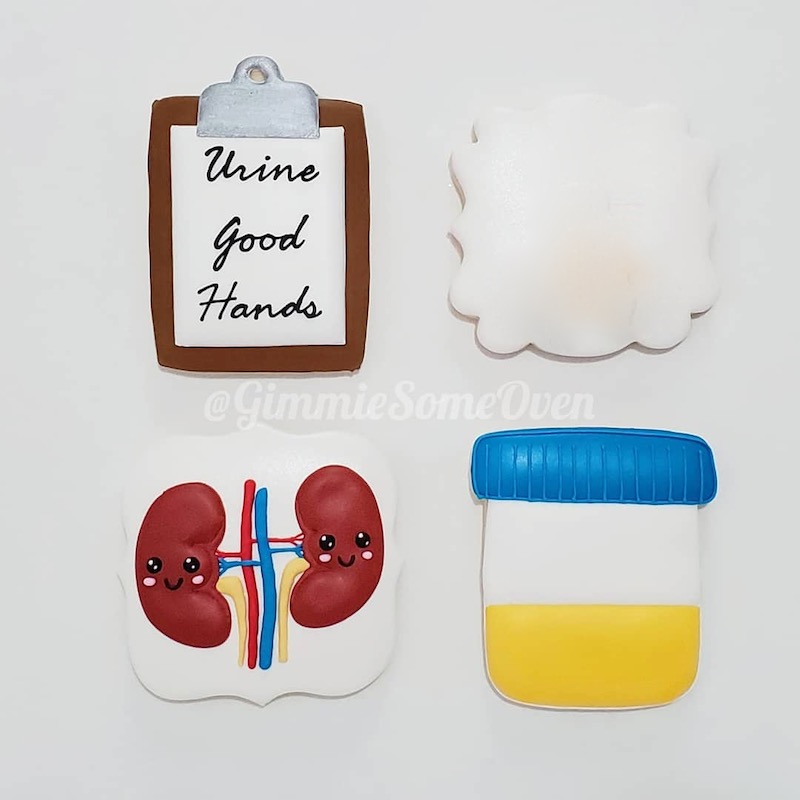 Cookies for a Urologist with kidneys and a clipboard that reads "Urine Good Hands"