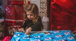 girl opening gifts